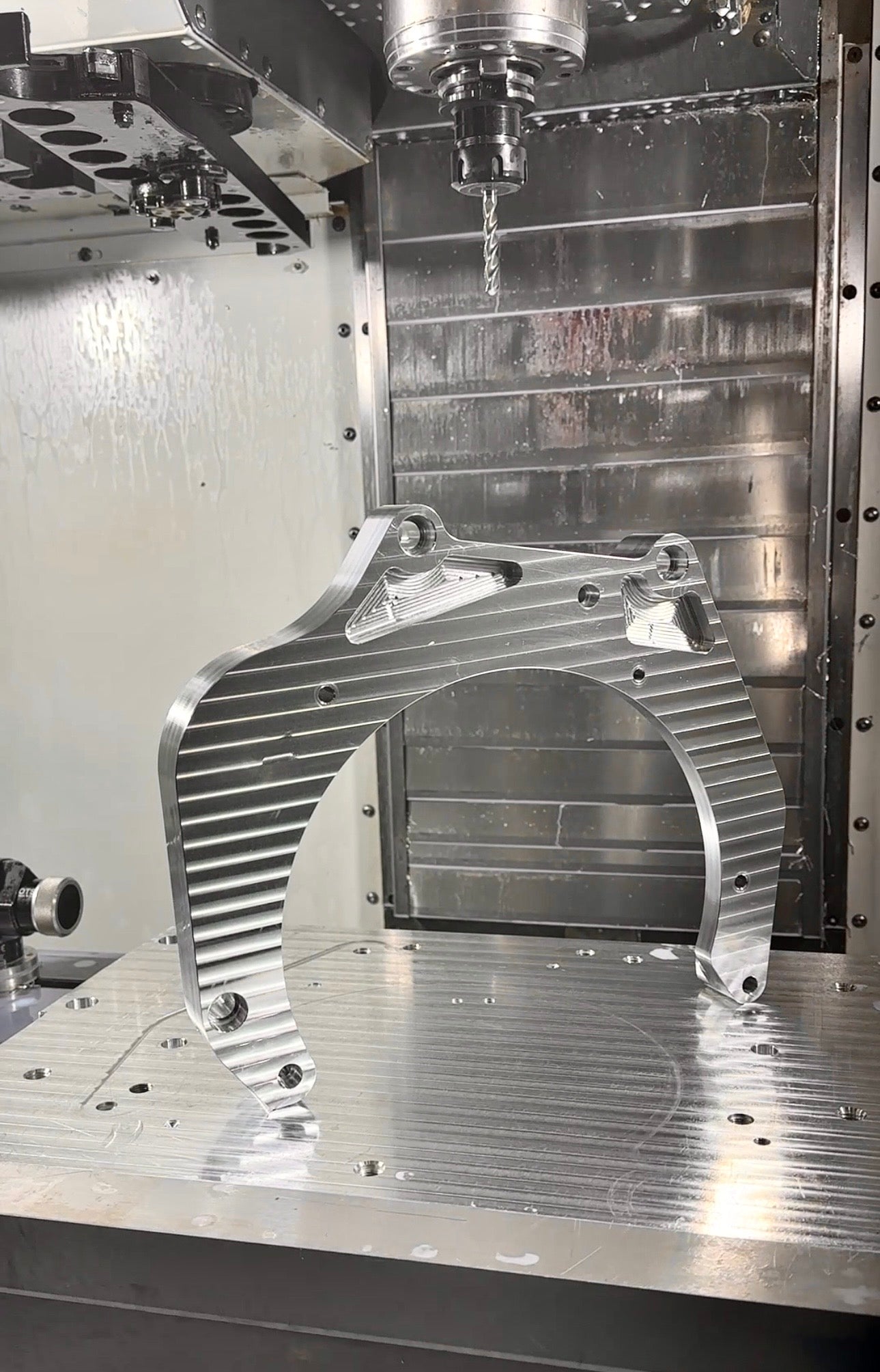 Completed RBZ Harmony K24 to Suzuki Samurai transmission adapter plate showing natural machined finish and CNC milling detail