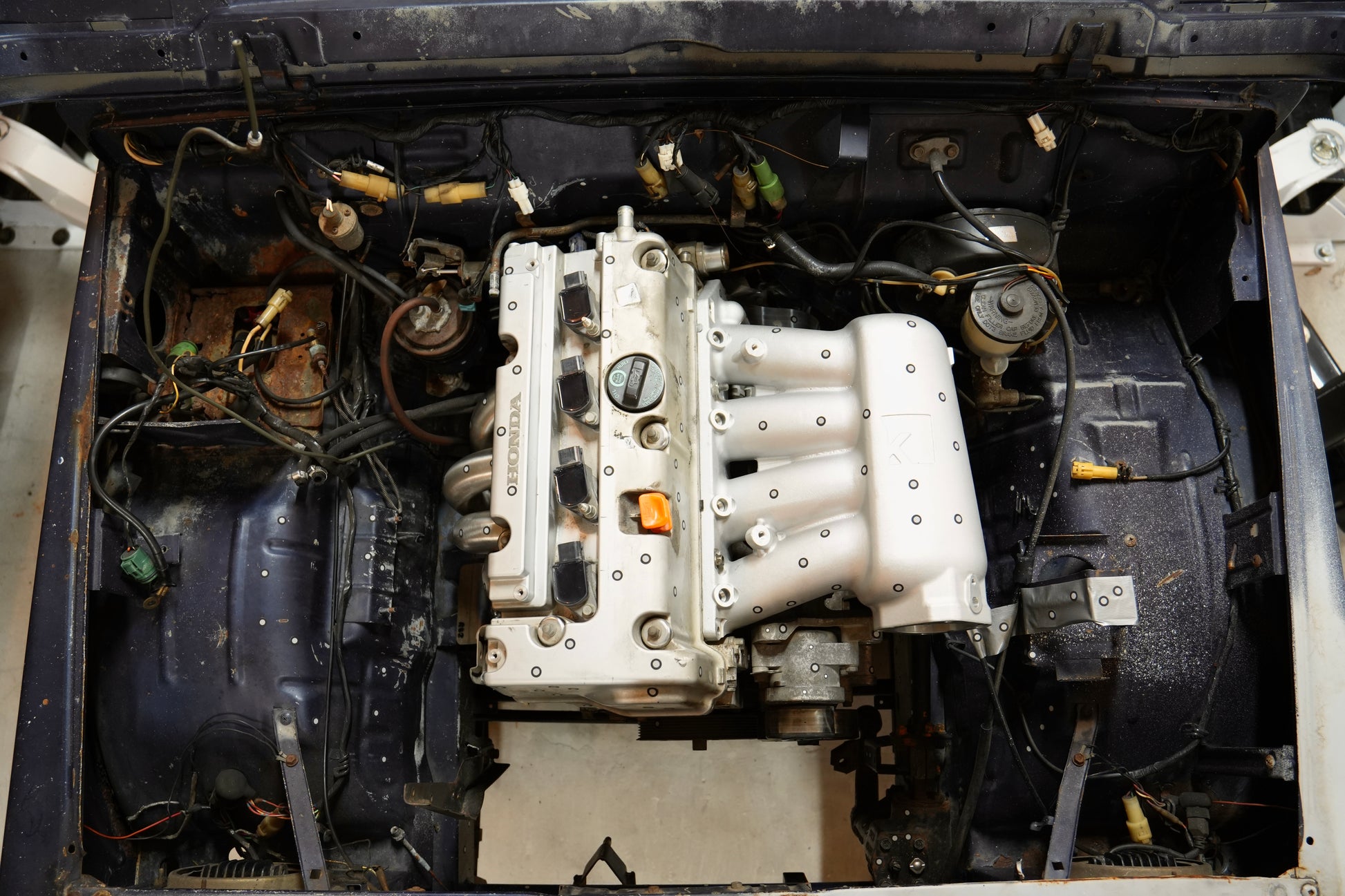 Top down view of K24 engine swap in Suzuki Samurai engine bay with RBZ Harmony mounts and Cerakote finish