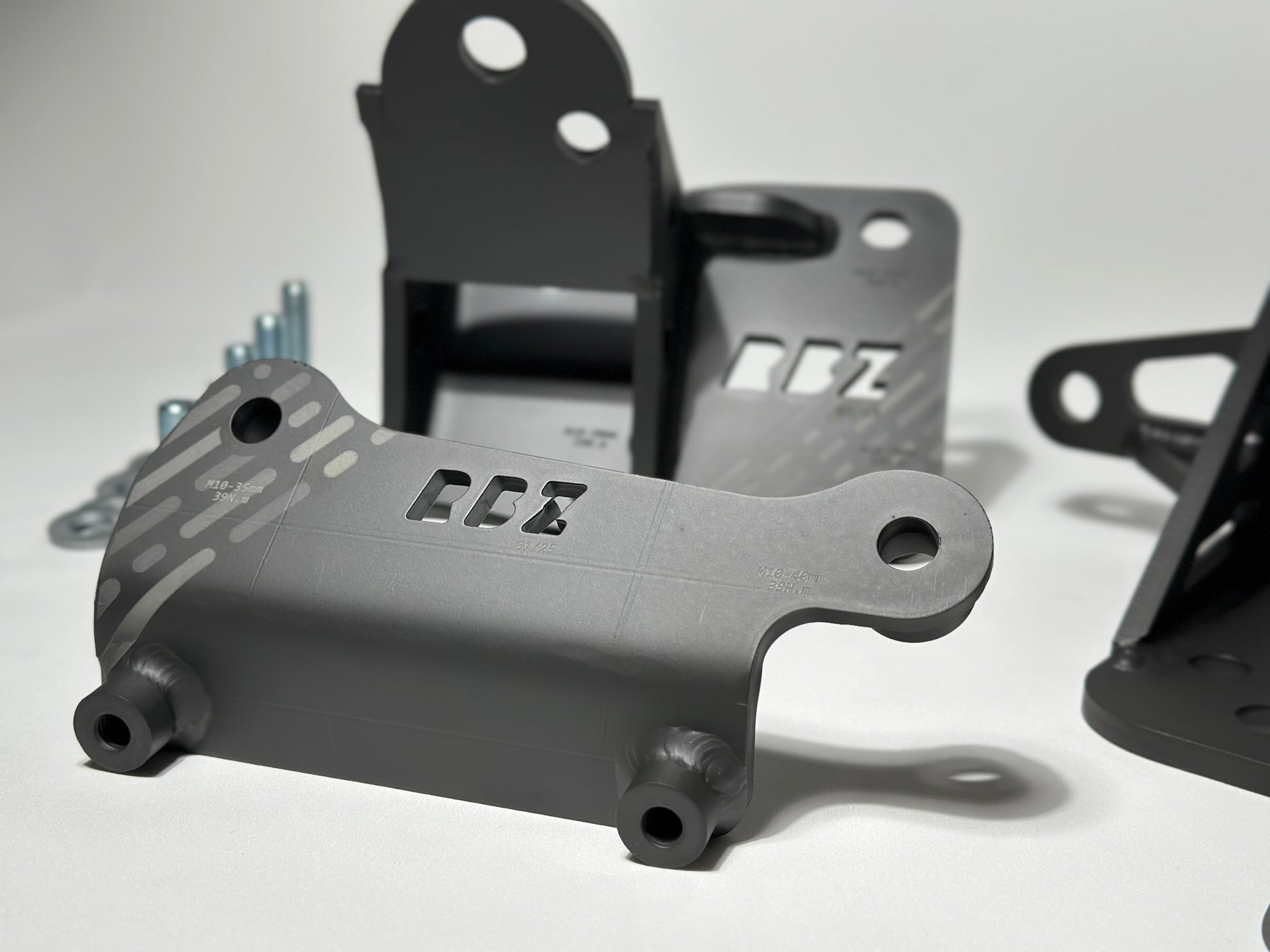 Plug-and-play K-series AC compressor bracket for S2000 K20A swap by RBZ Harmony, replaces OEM unit without modification
